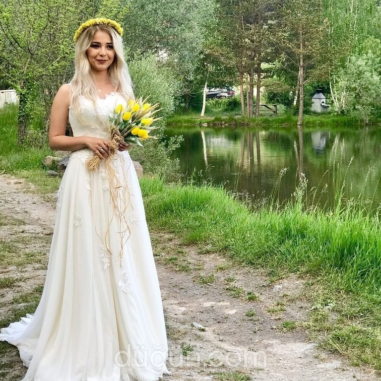 Kıvılcım Gelinlik & Modaevi